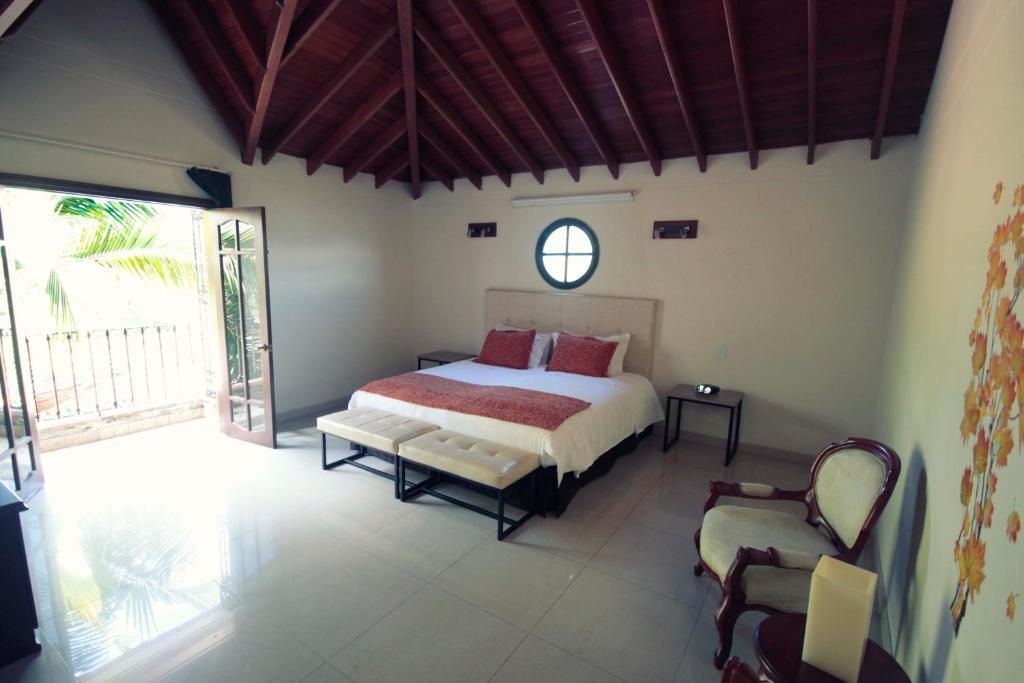 Villa De Los Angeles Medellín Szoba fotó