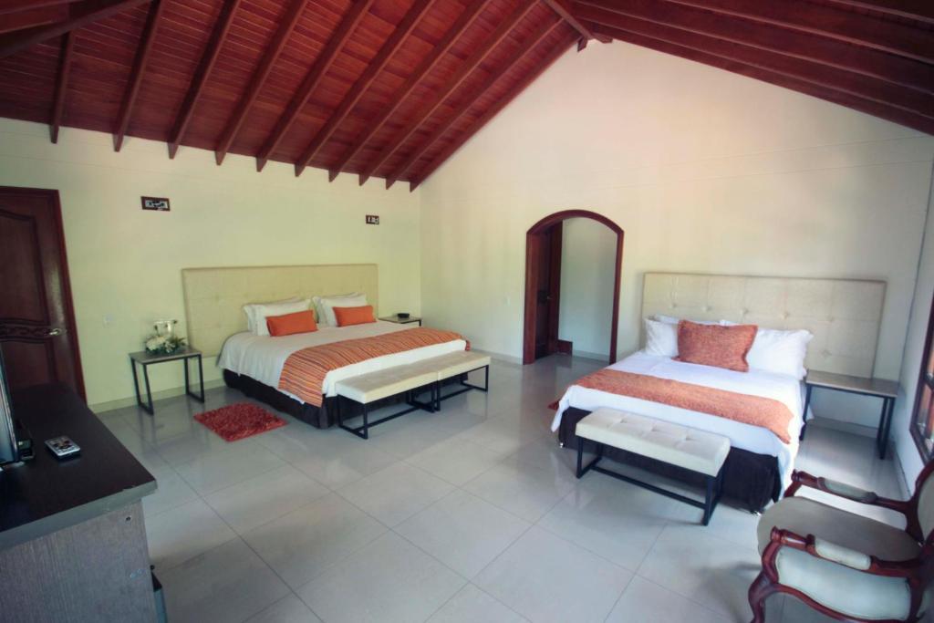 Villa De Los Angeles Medellín Szoba fotó